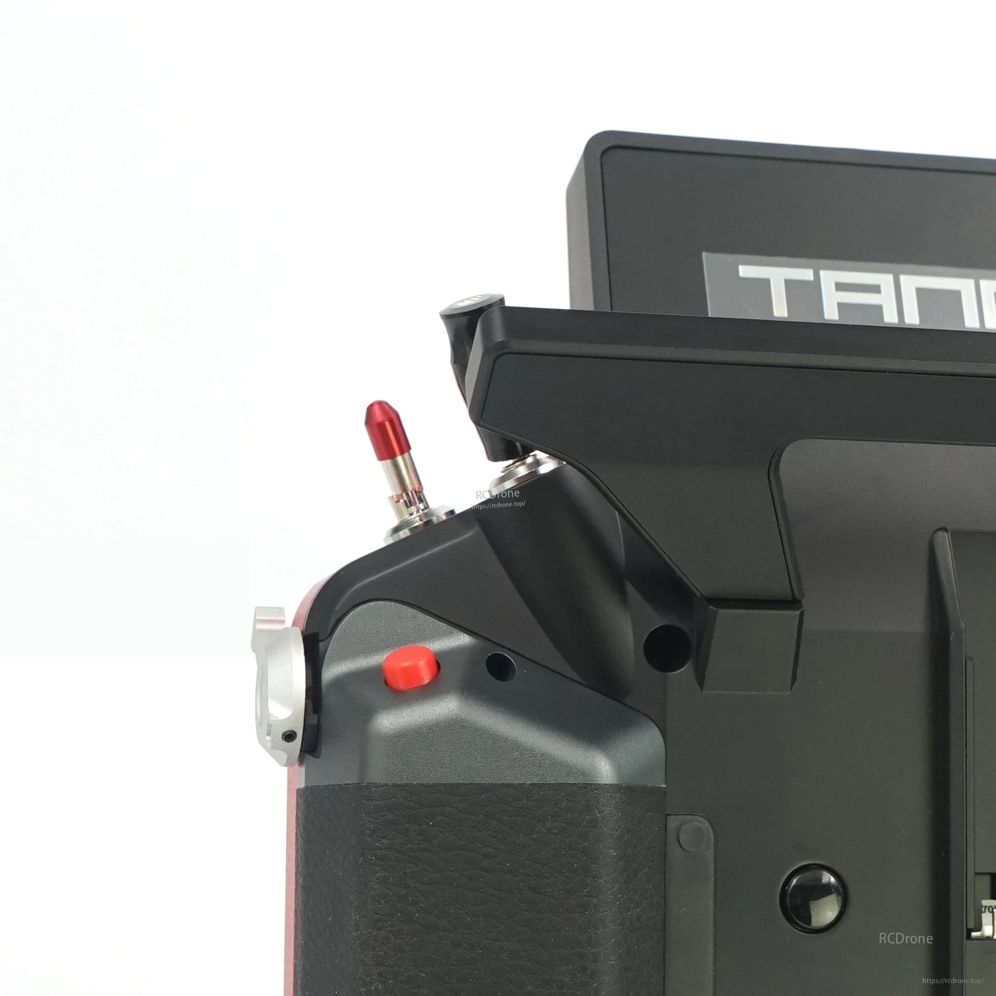 Side-rear close-up of Tandem X20 PRO showing screen hinge area and red side button