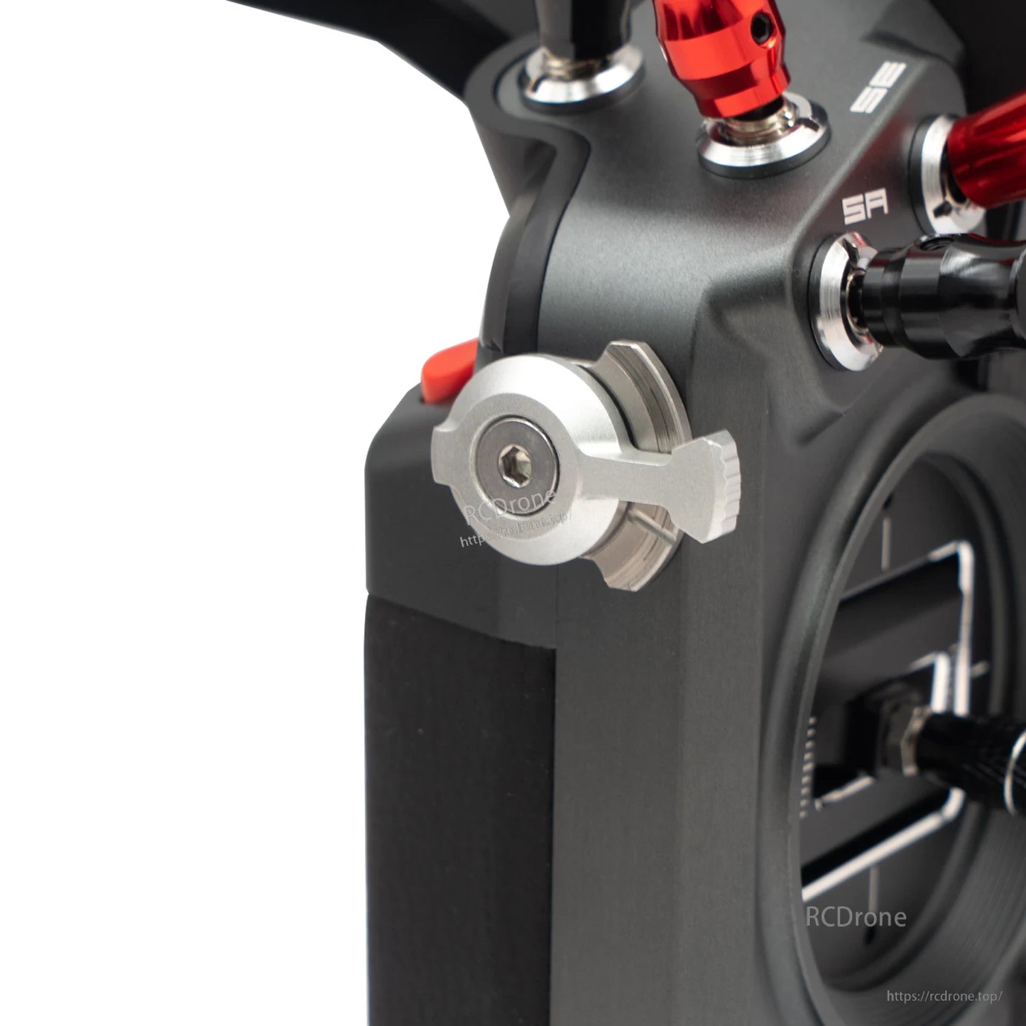 Close-up of side metal self-locking switch and carry strap loop on Tandem X20 PRO transmitter