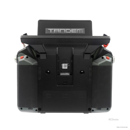 Rear view of Tandem X20 PRO transmitter showing back housing, grips, and center battery bay cover