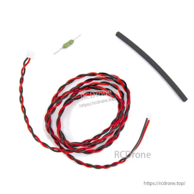 Twisted red/black sensor lead with white connectors, inline green component and black heat-shrink tube
