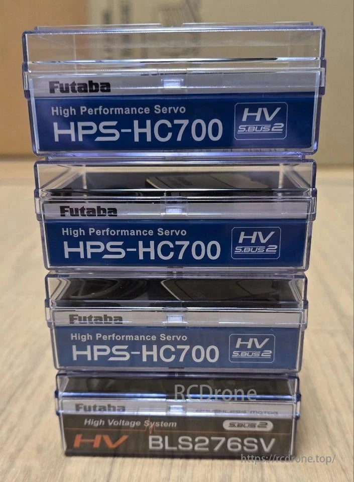 Futaba HPS-HC700: 20kg, 0.075s, brushless RC helicopter servo with S.Bus2, BEC ready; four servos in transparent pack with blue labels.
