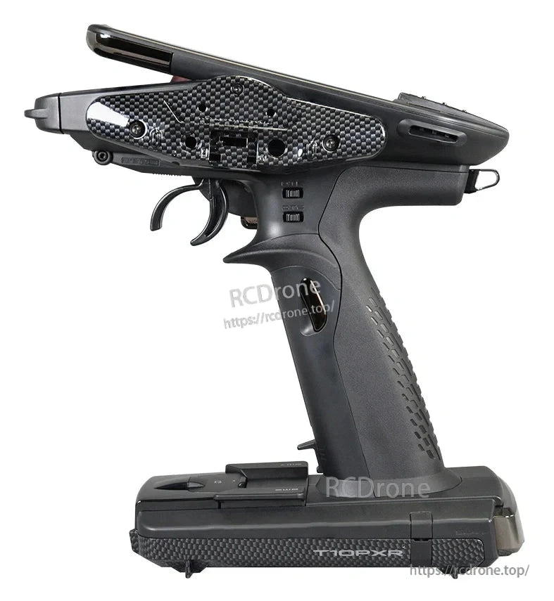 Futaba T10PXR 10-Channel Surface Transmitter, Side view of Futaba T10PXR 10-channel surface RC transmitter with pistol grip, trigger throttle, and carbon-fiber side plate