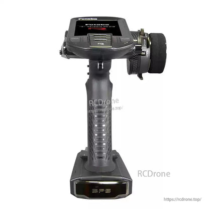 Futaba T10PXR 10-channel surface transmitter with steering wheel, top screen display, and pistol-grip handle