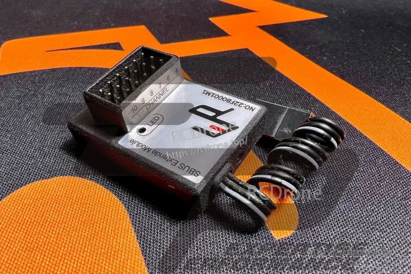 Futaba T10PXR 10-Channel Surface Transmitter, Futaba S.BUS expander module with 10-channel output header, status LED, and coiled cable