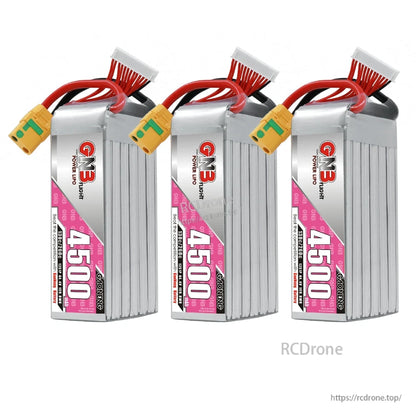 Three GNB 4500 LiPo batteries lineup, upright orientation with XT90S connectors and balance leads