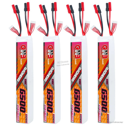 Four GNB 6500 battery packs upright in a row with discharge and balance leads at the top