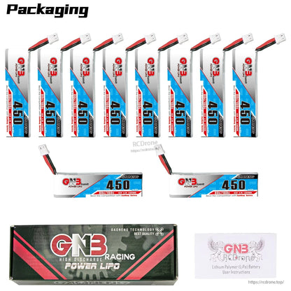 Packaging contents layout showing multi-pack of GNB 450 long-type LiPo batteries in mixed orientations, box and manual
