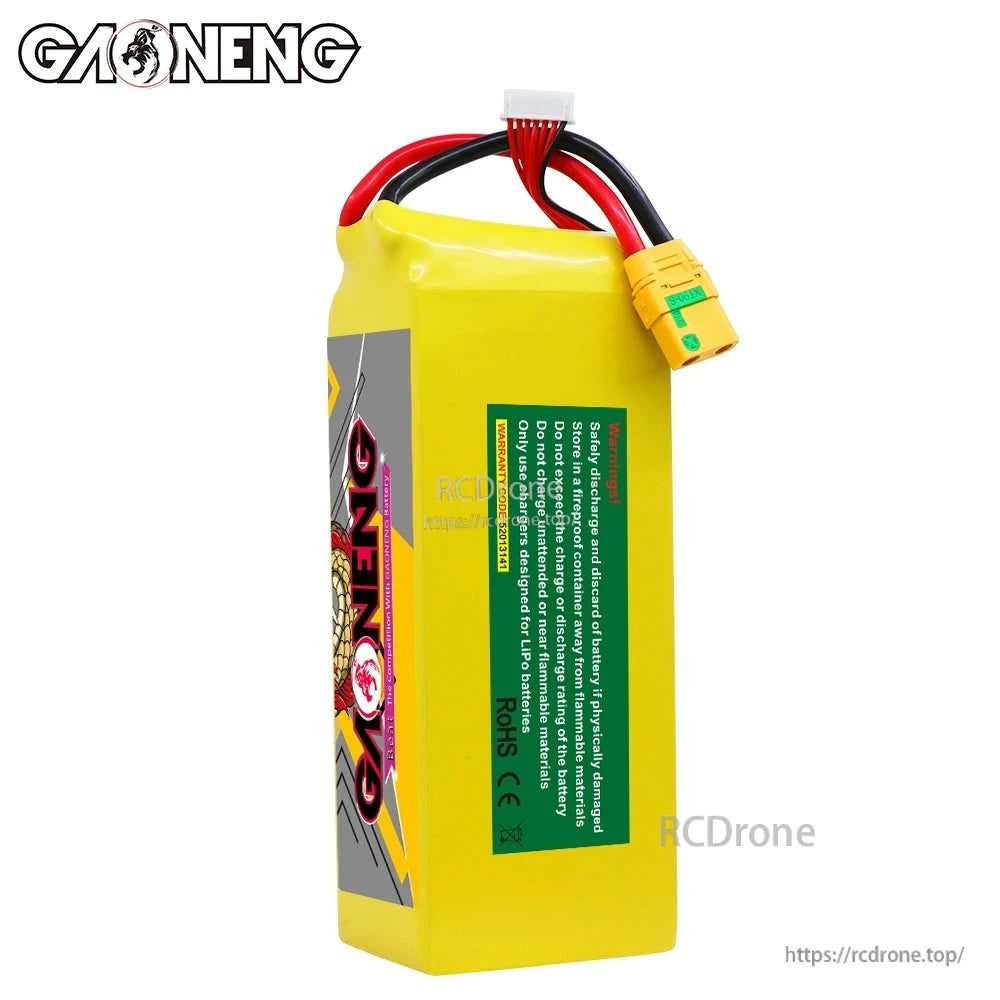 Rear view of GAONENG battery pack showing green safety/notice label, XT90S connector and balance plug