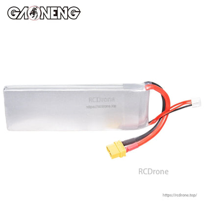 Rear side view of the LiPo battery pack showing plain silver casing, XT60 plug, and balance lead