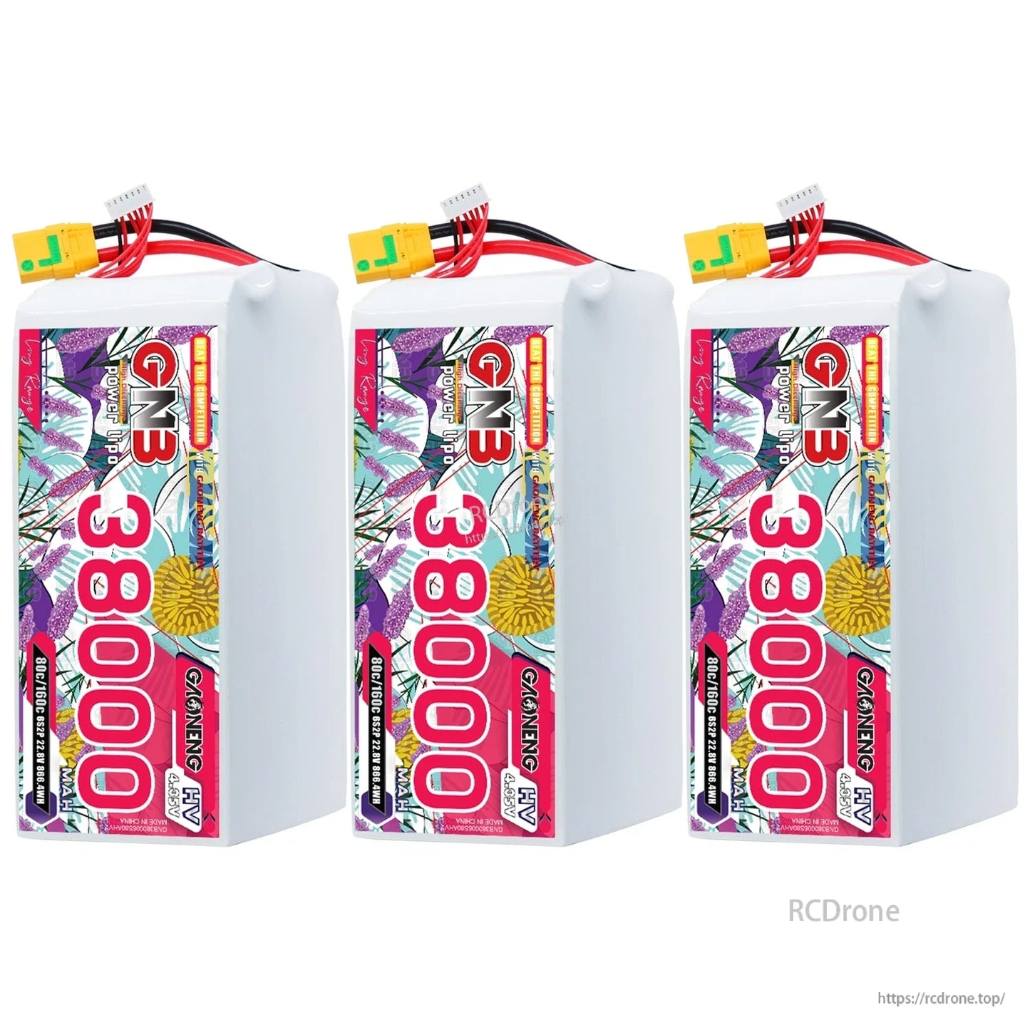 Three GNB 38000 battery packs lined up, front label side shown