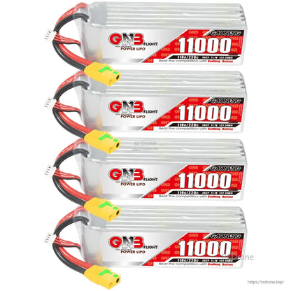 Four GNB 11000mAh LiPo batteries stacked, showing labels, power leads, and balance connectors