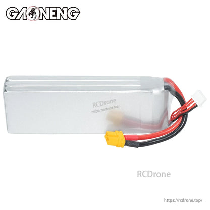 Rear side view of silver hardcase LiPo battery showing wire exit, XT60 plug, and 3S balance connector