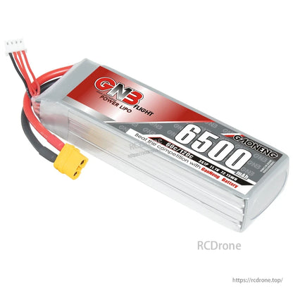 Angled close-up of GNB 6500mAh LiPo label and XT60 connector on silver pack