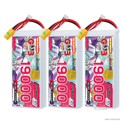 Three GNB 19000mAh HV LiPo battery packs lined up, each with balance plug and power lead