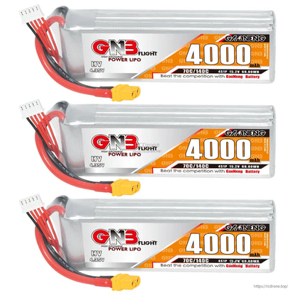 Three GNB 4000mAh 4S LiHV batteries with XT60 connectors lined up, label side visible
