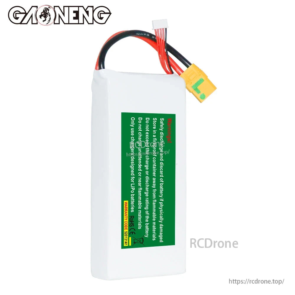 Back side of GAONENG GNB battery showing green safety/warning label and connector leads