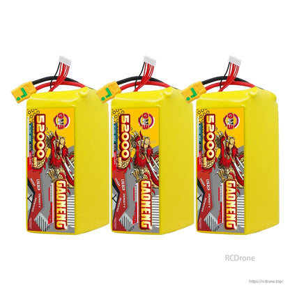 Three GAONENG 52000mAh battery packs displayed upright with XT90S discharge leads and balance plugs