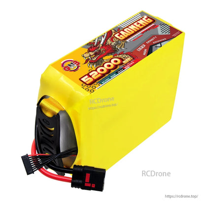 Top angled view of yellow GAONENG 52000mAh battery showing end cap, wiring and QS8 connector
