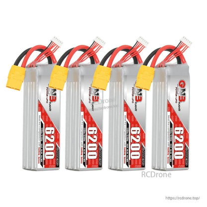 Four GNB 6200mAh LiPo batteries standing upright in a row with XT90 connectors