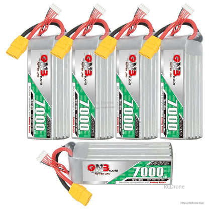 Five-battery bundle: four upright GNB 7000mAh packs plus one horizontal pack with label visible