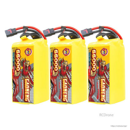 Three GAONENG 66000mAh battery packs lined up, upright view with QS8 connectors on top