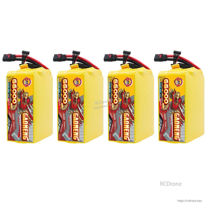 Four GAONENG battery packs lined up, front label view with QS8 leads visible