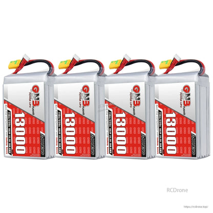 Four GNB 13000mAh 6S LiPo batteries lined up, vertical orientation with XT90S connectors visible