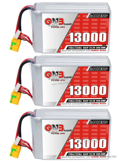 Three GAONENG GNB 13000mAh 6S LiPo battery packs stacked, showing side label and XT90S connectors