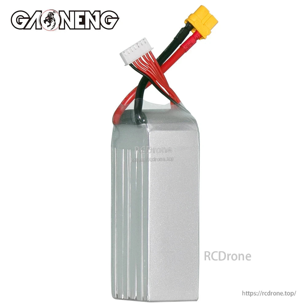 Side/rear view of silver GNB LiPo pack showing ribbed case profile with XT60 and balance connector