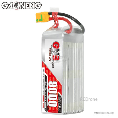 Upright side view of GNB 9000mAh LiPo pack showing thick power leads, balance plug, and top exit