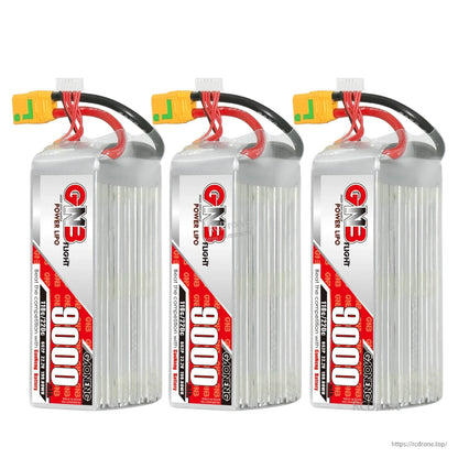 Three GNB 9000mAh LiPo battery packs lineup showing connectors and balance leads