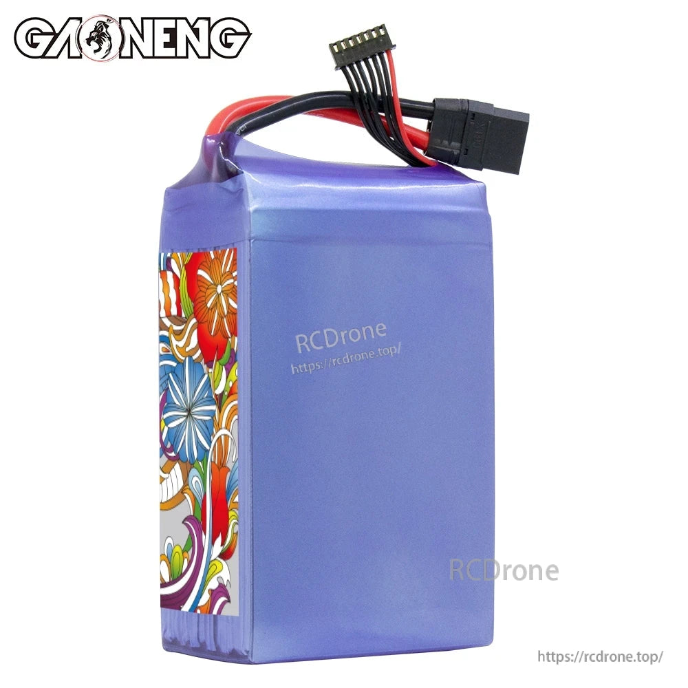 Plain side view of purple shrink-wrapped GNB LiPo battery showing XT90 plug and balance connector