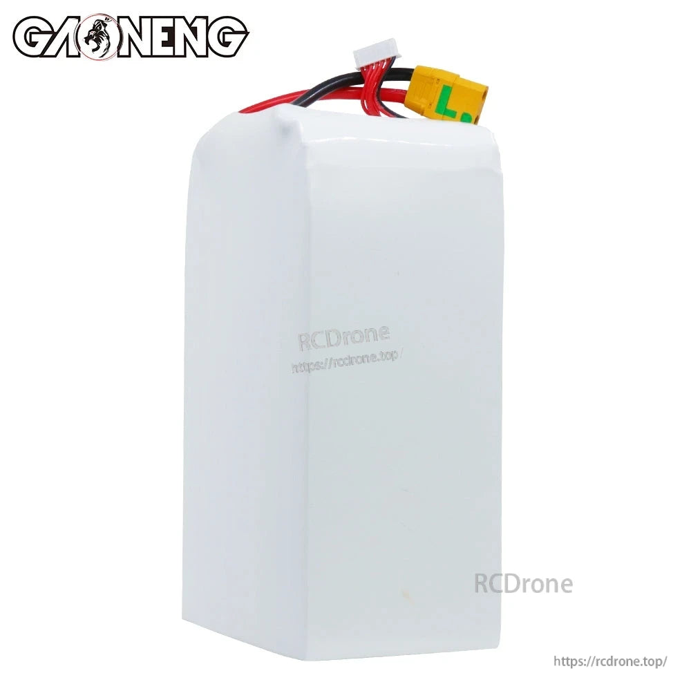Rear view of battery in white shrink wrap with wires and yellow XT90S connector at top