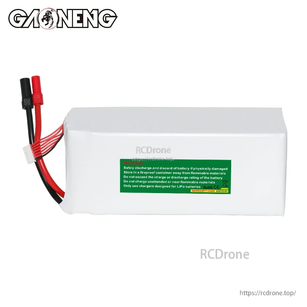 Rear view of battery showing green safety warning label and power leads