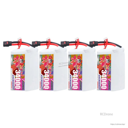 Four GNB 34000mAh battery packs lineup showing QS8 connectors and balance leads
