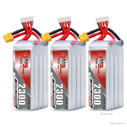 Three-pack lineup of GNB 2300mAh LiPo batteries, each with XT60 connector and balance lead