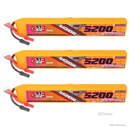 Three GNB 8S 5200mAh 110C LiPo battery packs lineup showing label side and wiring leads