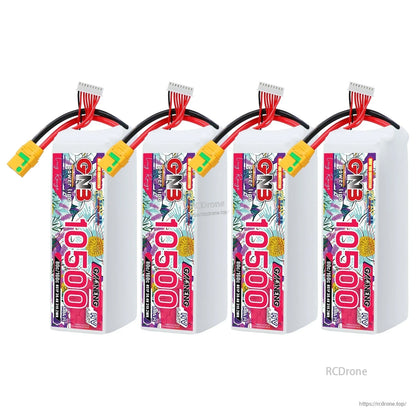 Four GNB 10500 8S HV LiPo batteries shown upright with XT90S leads