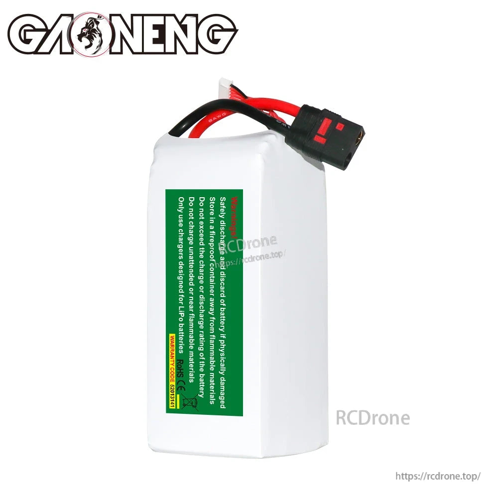 Rear view of battery pack showing green safety warning label and QS8 discharge connector