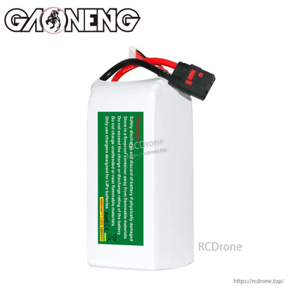 Rear view of battery pack showing green safety warning label and QS8 discharge connector