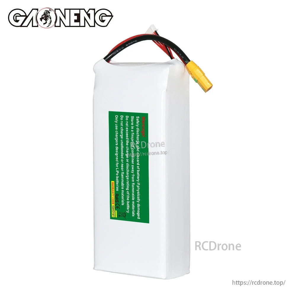 Rear view of LiPo battery with green safety warning label and power leads at top