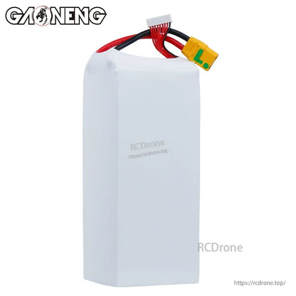 Rear side view of white GNB battery pack showing plain casing and wire exit at top