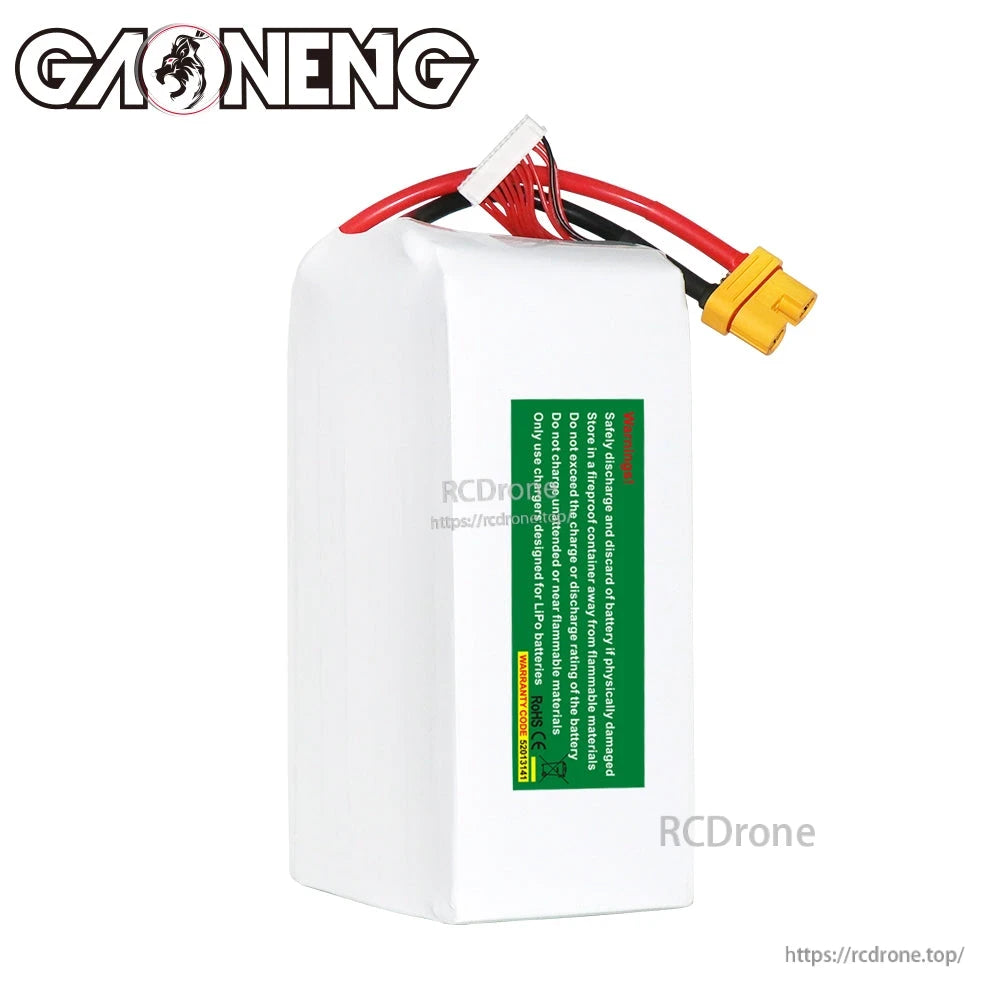 Rear/side view showing green safety warning label, balance lead and AS150 power connector