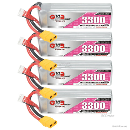 Four GNB 3300mAh LiPo batteries stacked with leads on left, labels facing forward