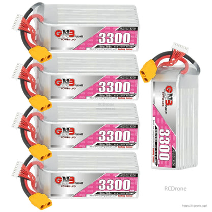 Five batteries shown: four stacked plus one standing upright, XT90 connectors and balance leads visible