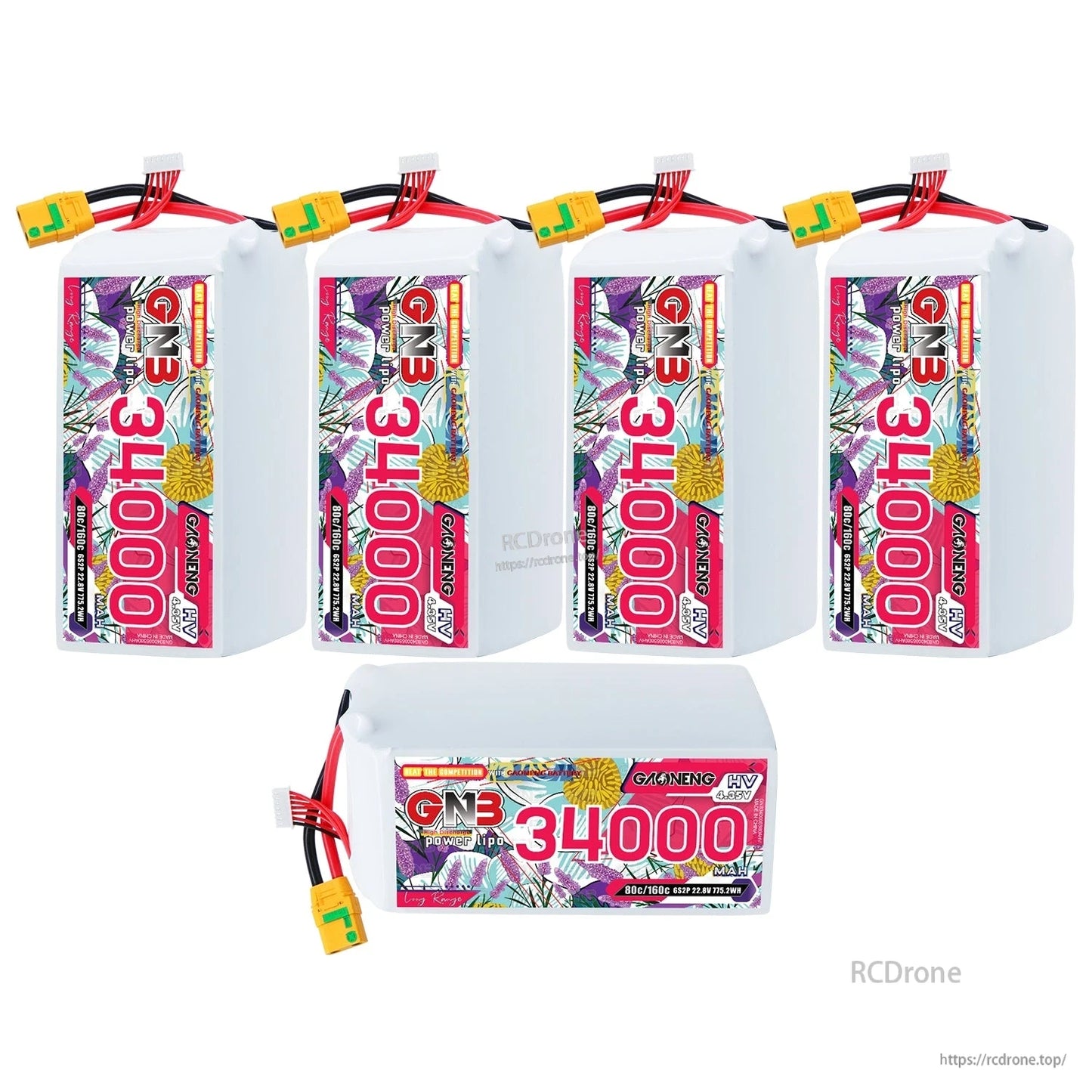 Bundle display with four upright GNB 34000 packs plus one pack lying flat, connectors visible