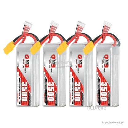 Four GNB 3500mAh LiPo batteries lined up, upright label views with XT90 connectors
