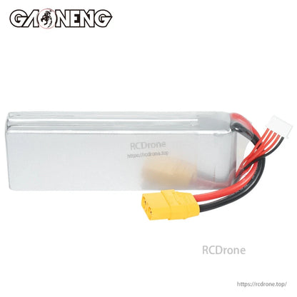 Plain side view of silver LiPo pack with XT90 connector and balance lead, no label visible