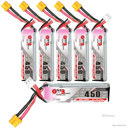 Set of six GNB 450 batteries displayed with one laid horizontally, showing connectors and leads
