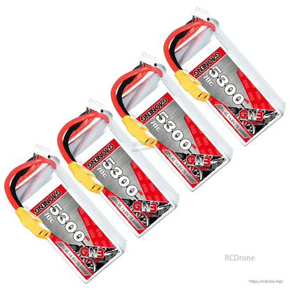 Four GAONENG 5300mAh 70C LiPo batteries arranged diagonally, showing labels and balance leads